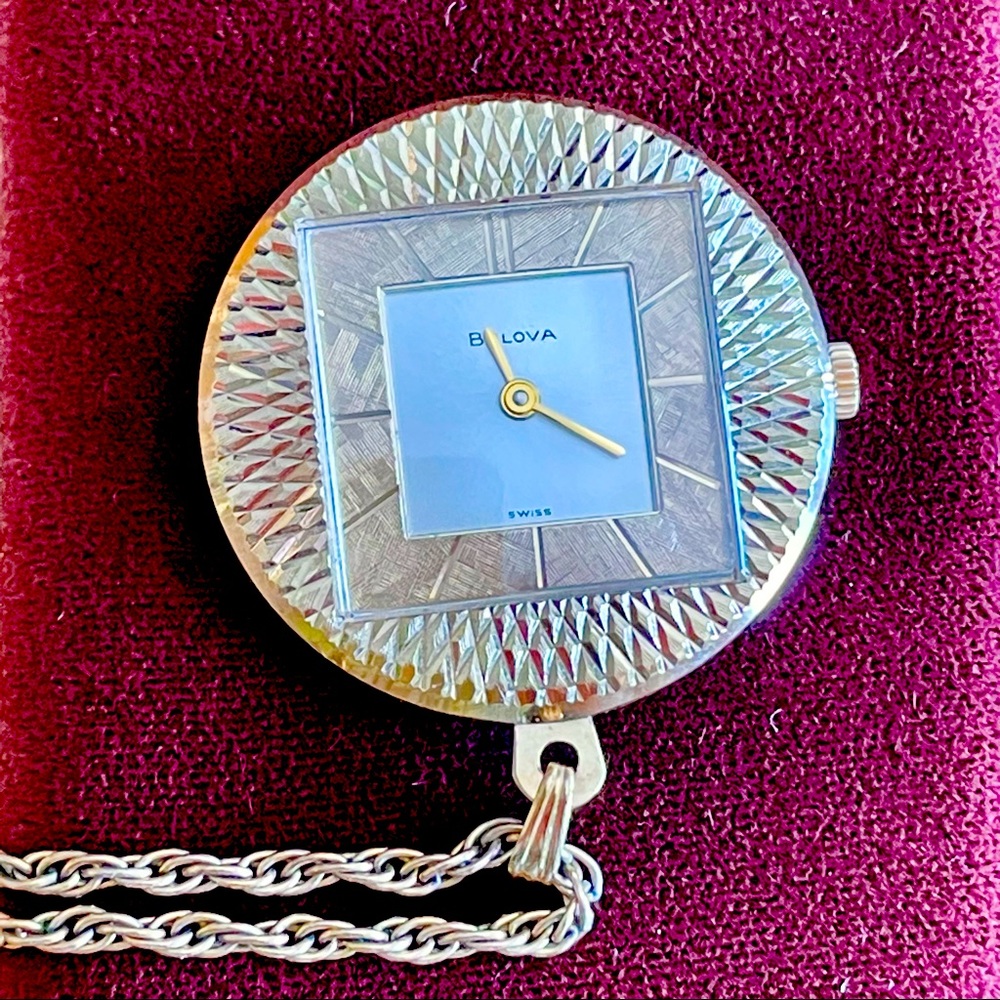 Gorgeous vintage Bulova necklace watch. Works well!